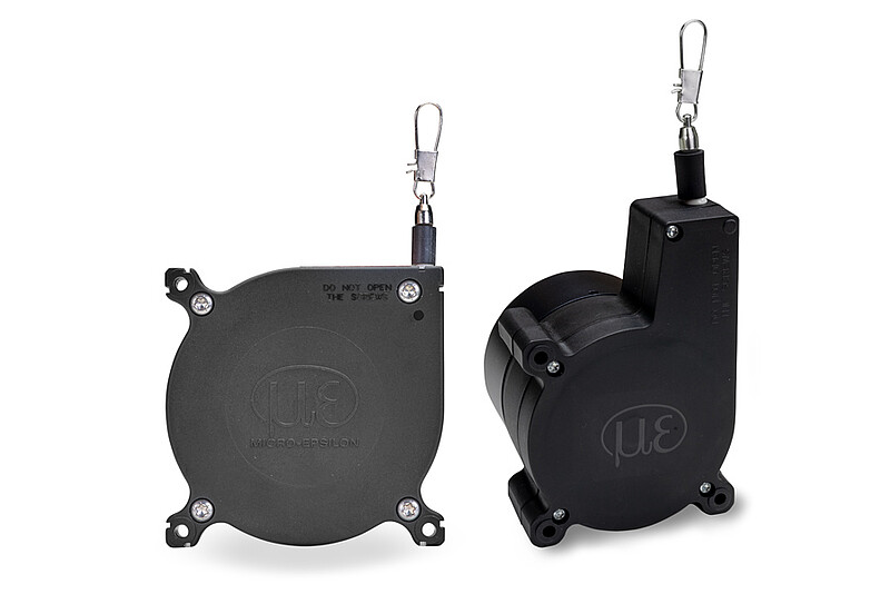 Mecanismos de sensor de tracción por cable con carcasa de plástico