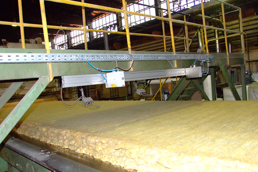 Medición del grosor de lana mineral
